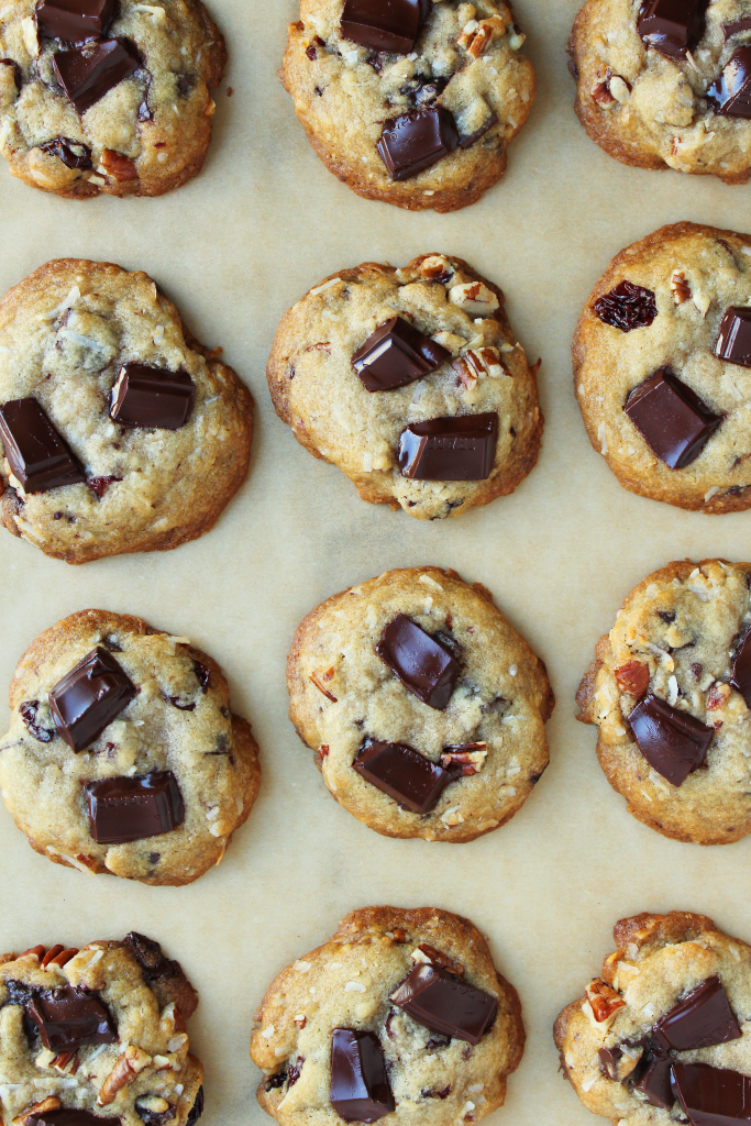 AMAZING Dark Chocolate Toasted Pecan Cookies! Soft gooey middles, crispy/crunchy edges = the PERFECT cookie!  #dairyfree #recipe | peachandthecobbler.com