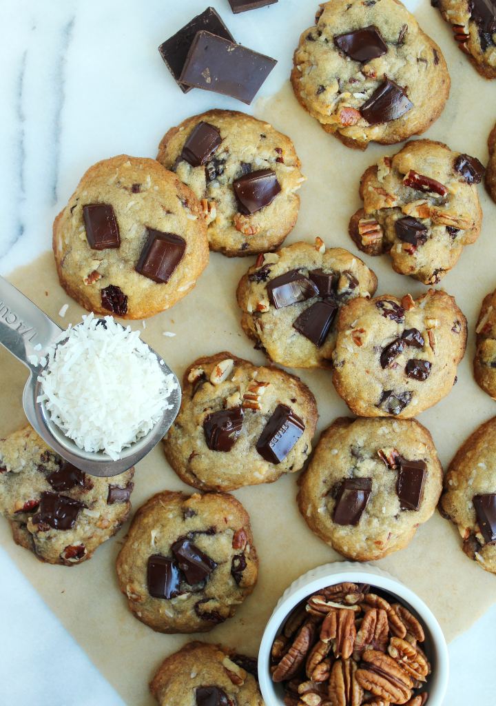 AMAZING Dark Chocolate Toasted Pecan Cookies! Soft gooey middles, crispy/crunchy edges = the PERFECT cookie!  #dairyfree #recipe | peachandthecobbler.com