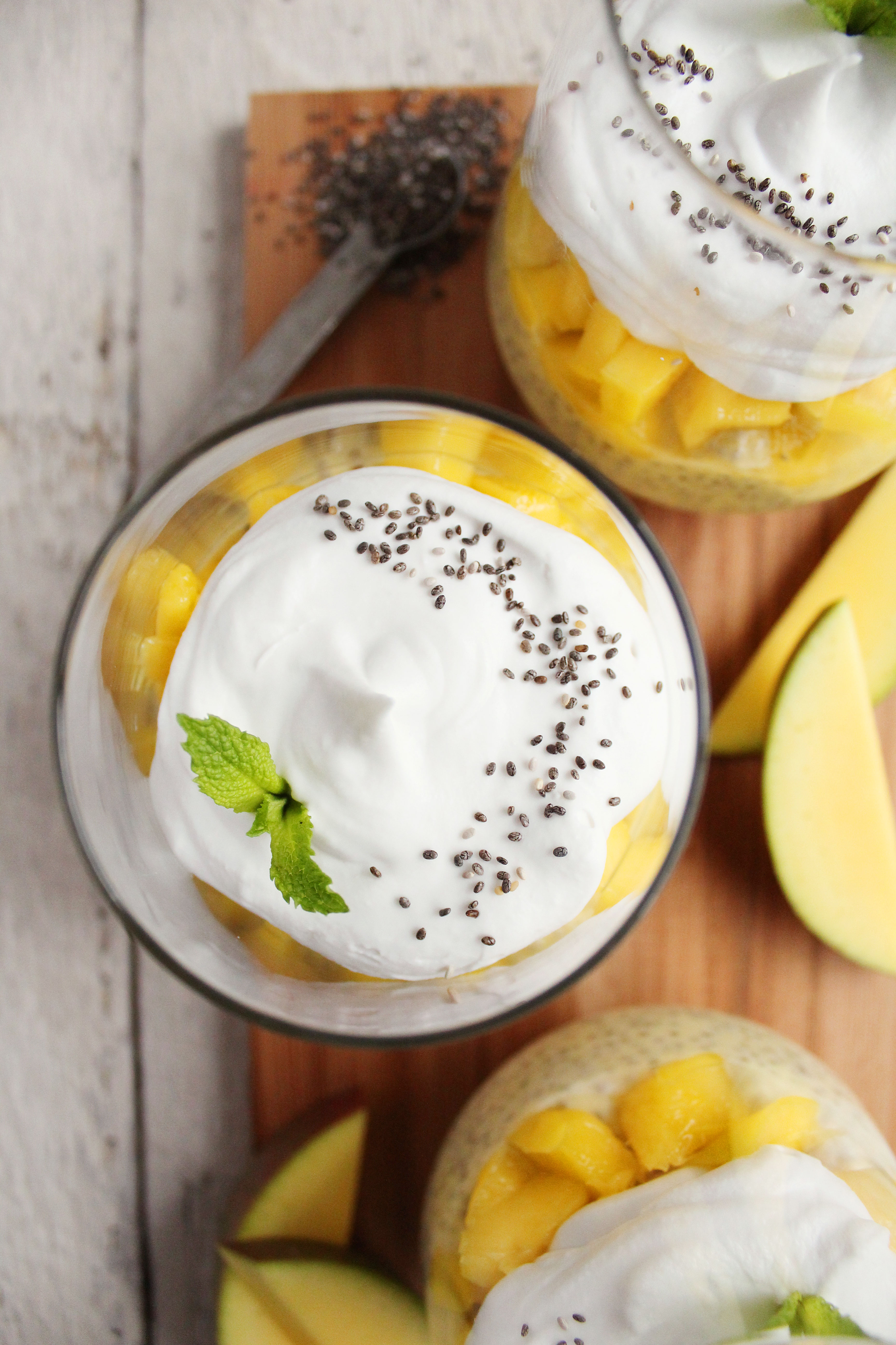 EASY Mango Chia Pudding! Naturally sweetened, SUPER creamy + topped with pillowy coconut whipped cream! YUM! #vegan #glutenfree #recipe | Peach and the Cobbler