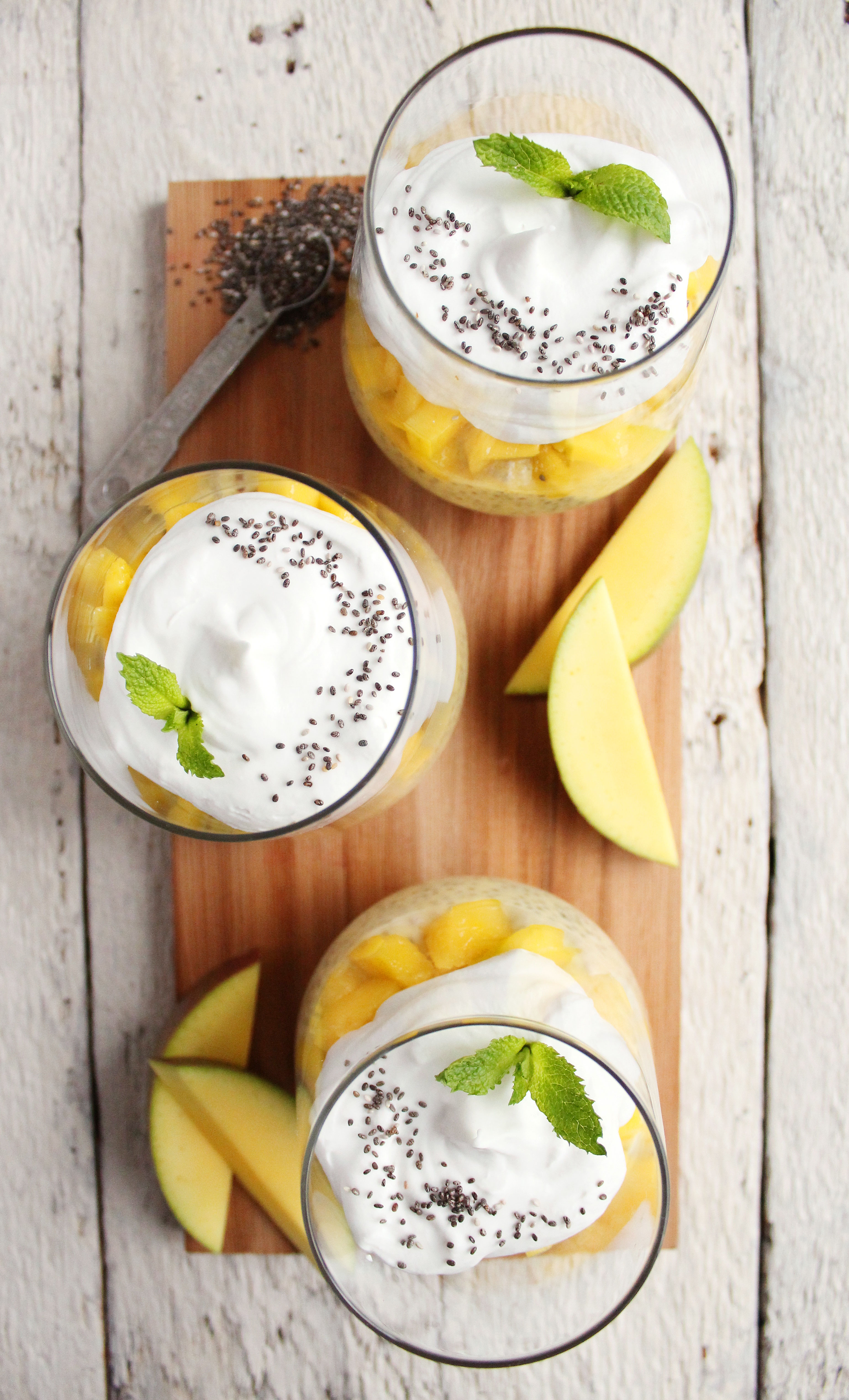 EASY Mango Chia Pudding! Naturally sweetened, SUPER creamy + topped with pillowy coconut whipped cream! YUM! #vegan #glutenfree #recipe | Peach and the Cobbler