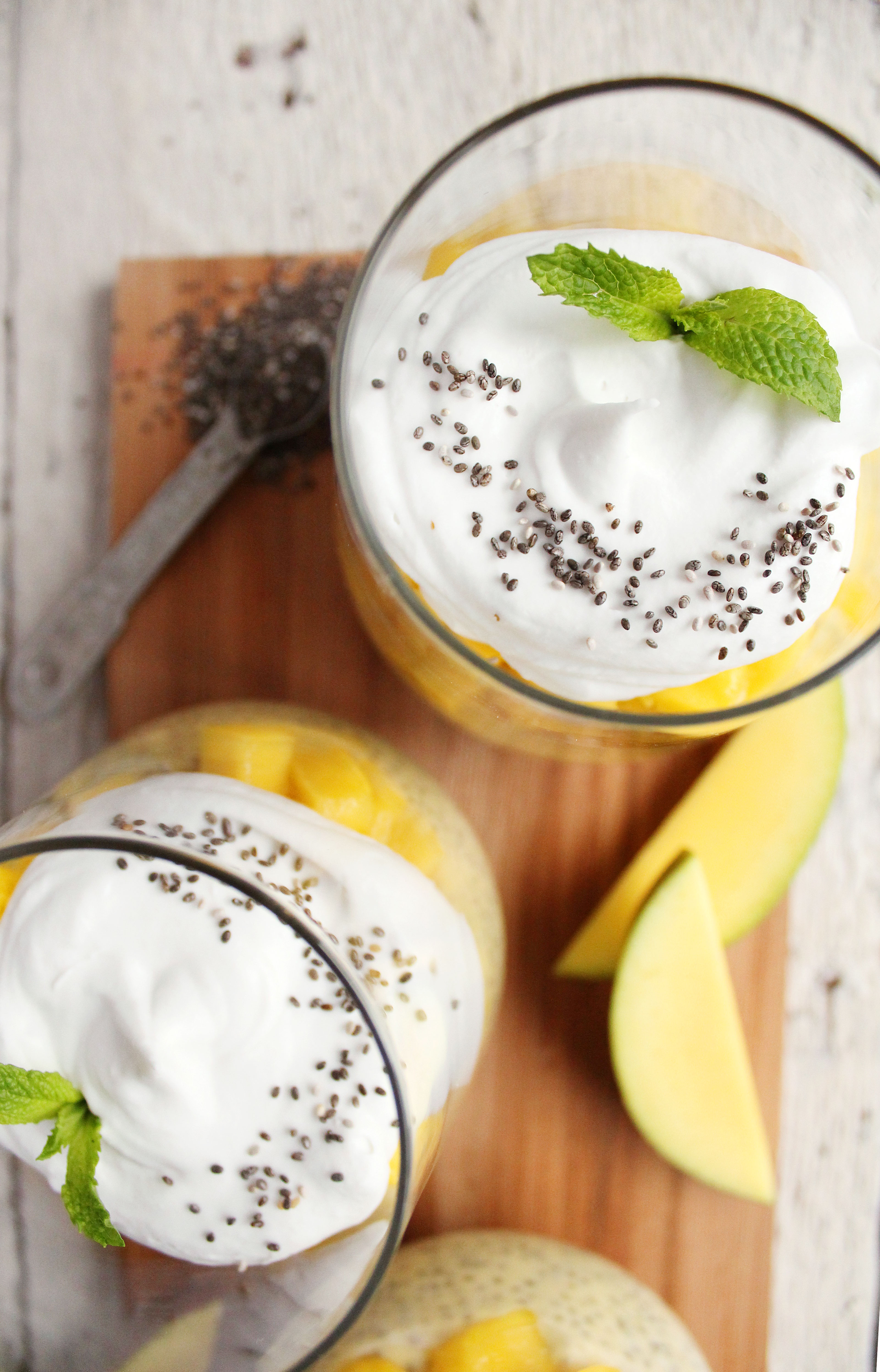 EASY Mango Chia Pudding! Naturally sweetened, SUPER creamy + topped with pillowy coconut whipped cream! YUM! #vegan #glutenfree #recipe | Peach and the Cobbler