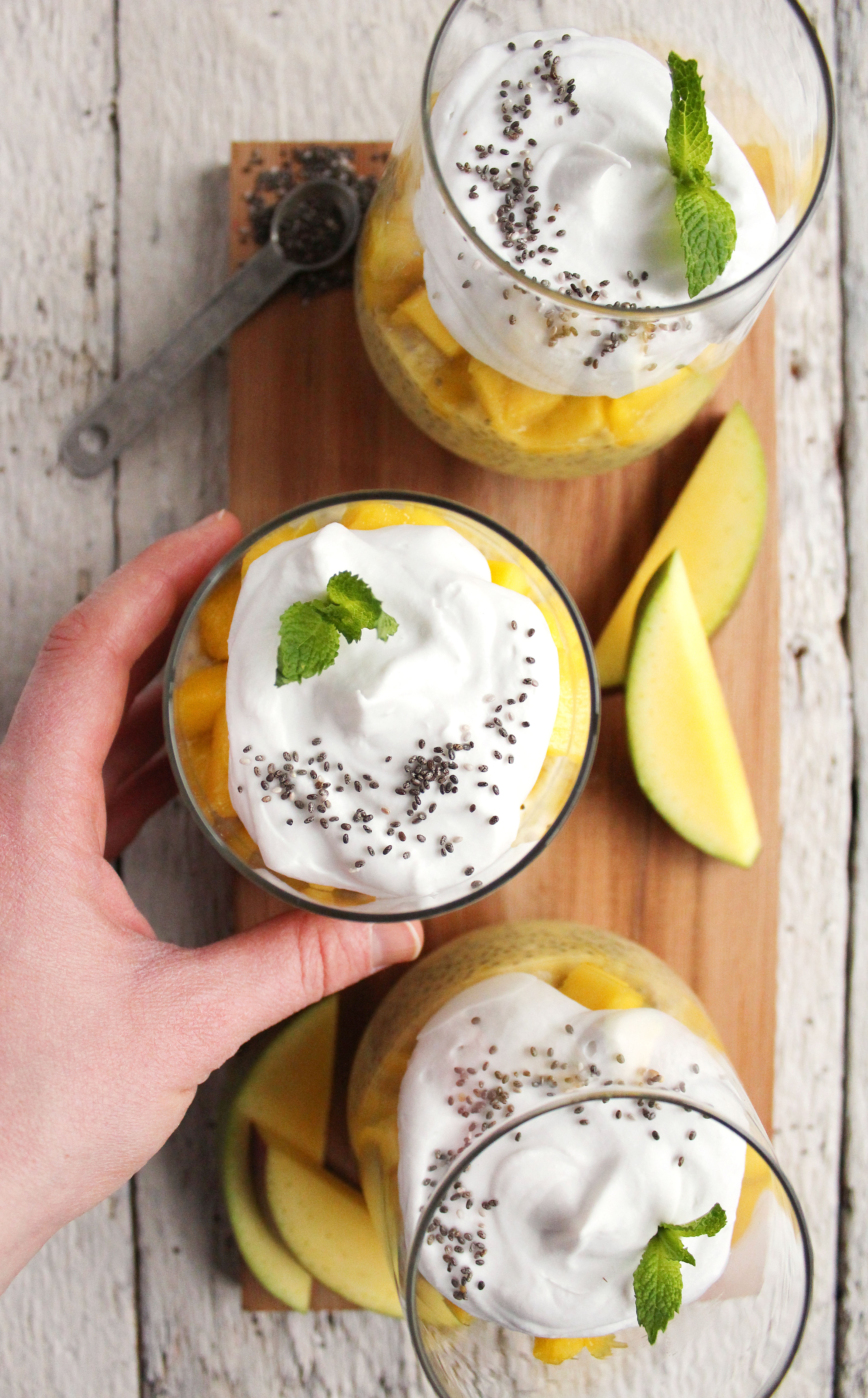 EASY Mango Chia Pudding! Naturally sweetened, SUPER creamy + topped with pillowy coconut whipped cream! YUM! #vegan #glutenfree #recipe | Peach and the Cobbler