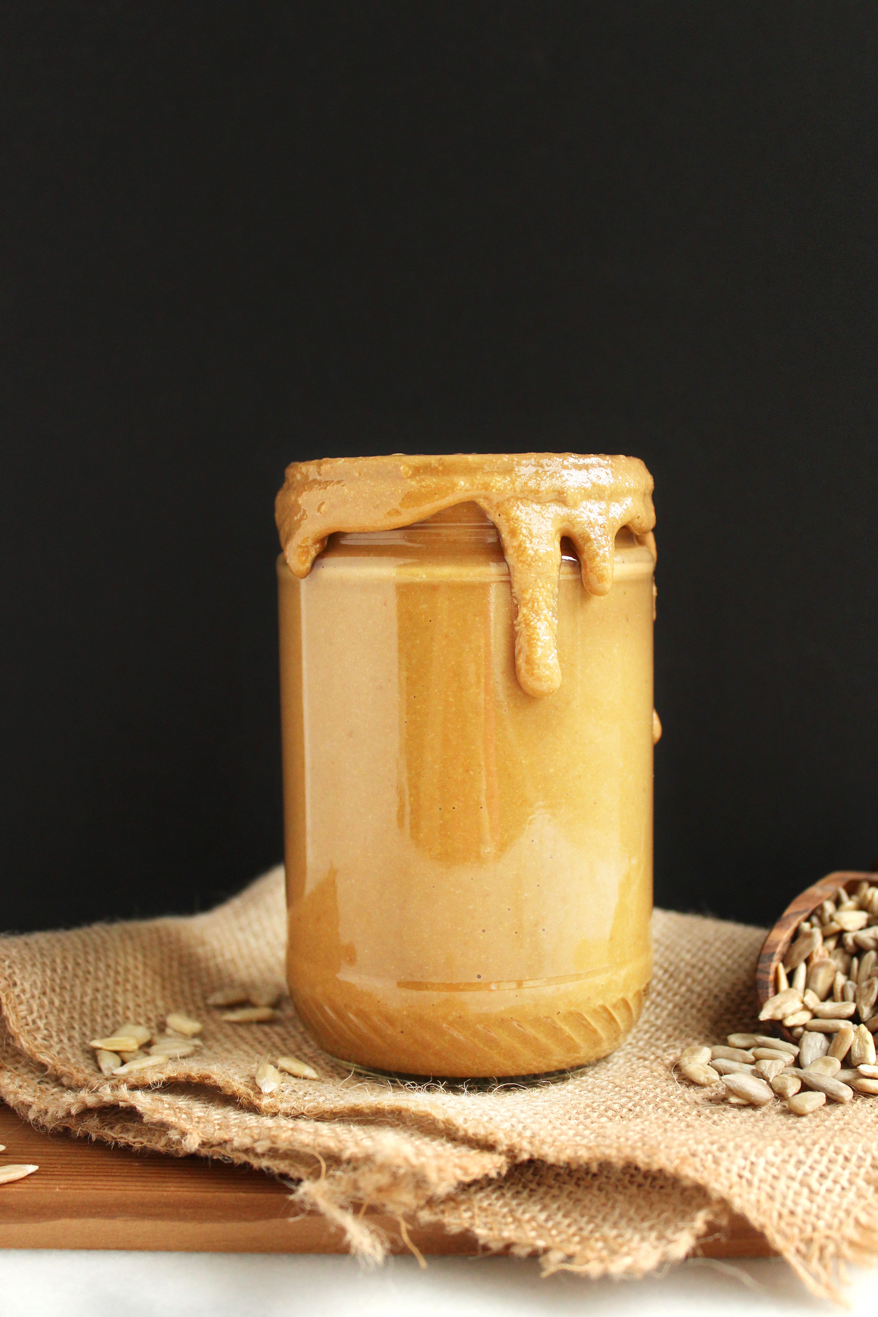 AMAZING Homemade Sunflower Seed Butter! 2-ingredients, SUPER creamy, & surprisingly nutty! Great on toast, in smoothies, or just on a spoon! #vegan | Peachandthecobbler.com