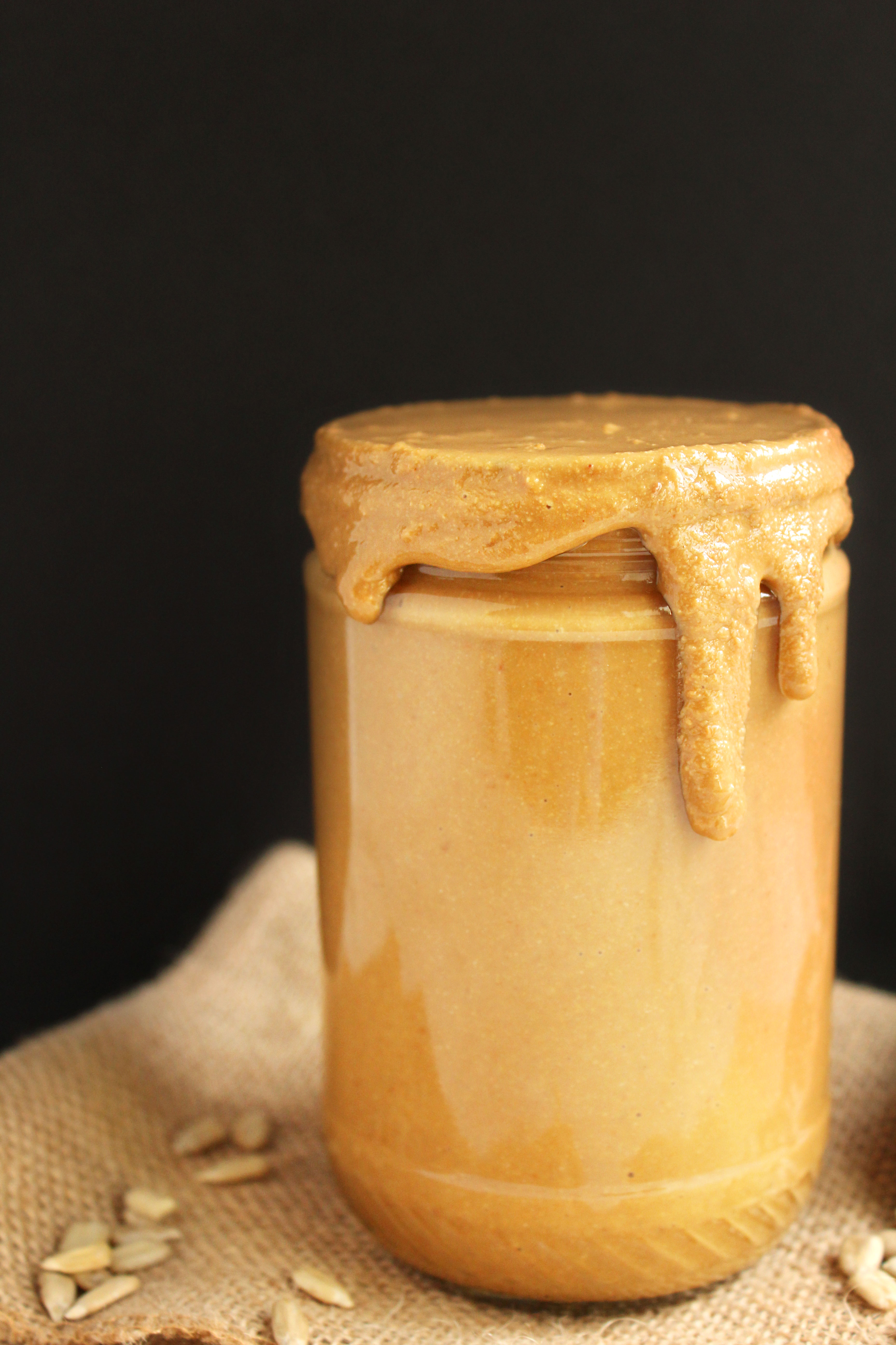 AMAZING Homemade Sunflower Seed Butter! 2-ingredients, SUPER creamy, & surprisingly nutty! Great on toast, in smoothies, or just on a spoon! #vegan | Peachandthecobbler.com