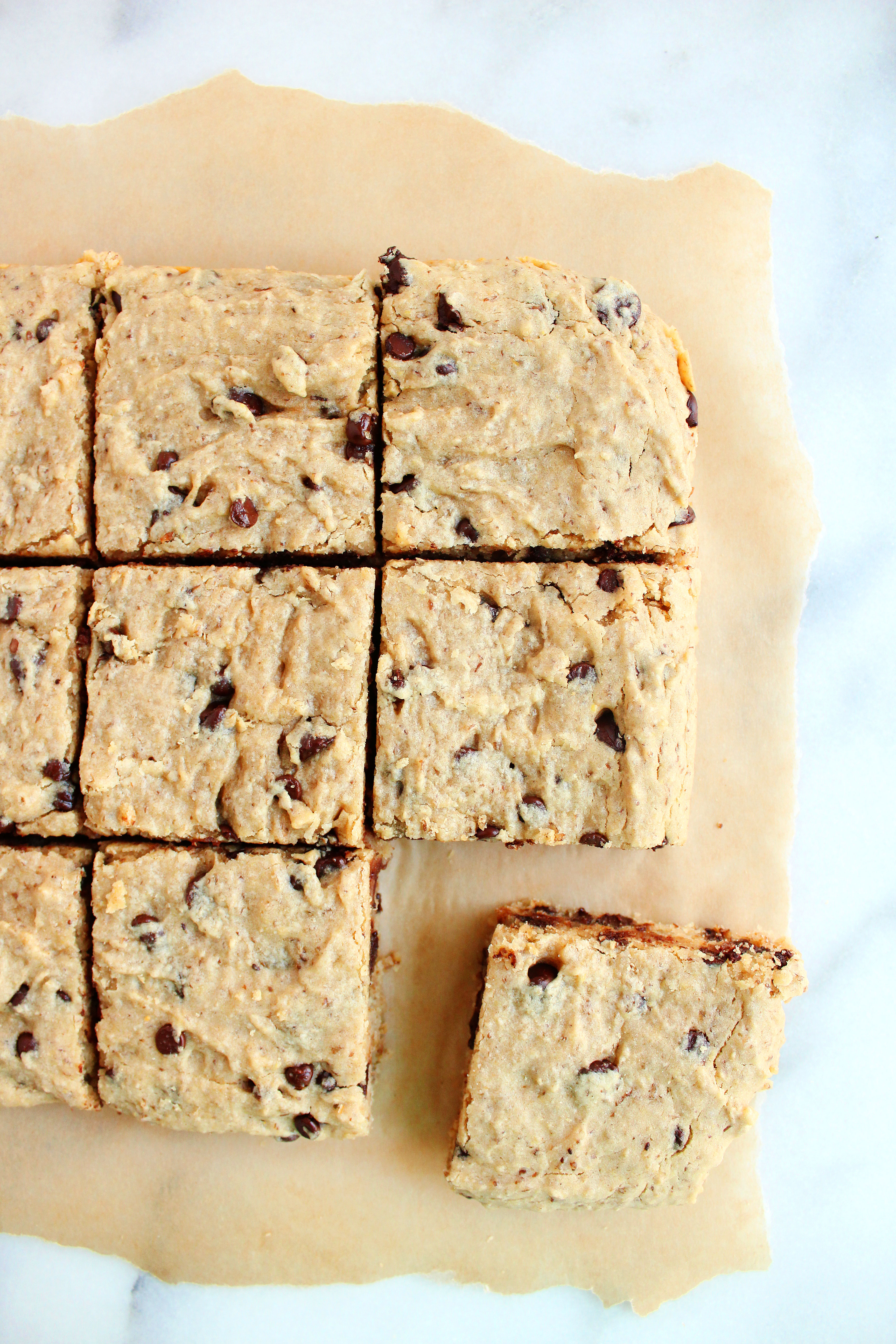 AMAZING Tahini Blondies! SO moist, super flavorful, and vegan + gluten free + refined sugar free! #vegan #glutenfree #blondies #refinedsugarfree | Peach and the Cobbler