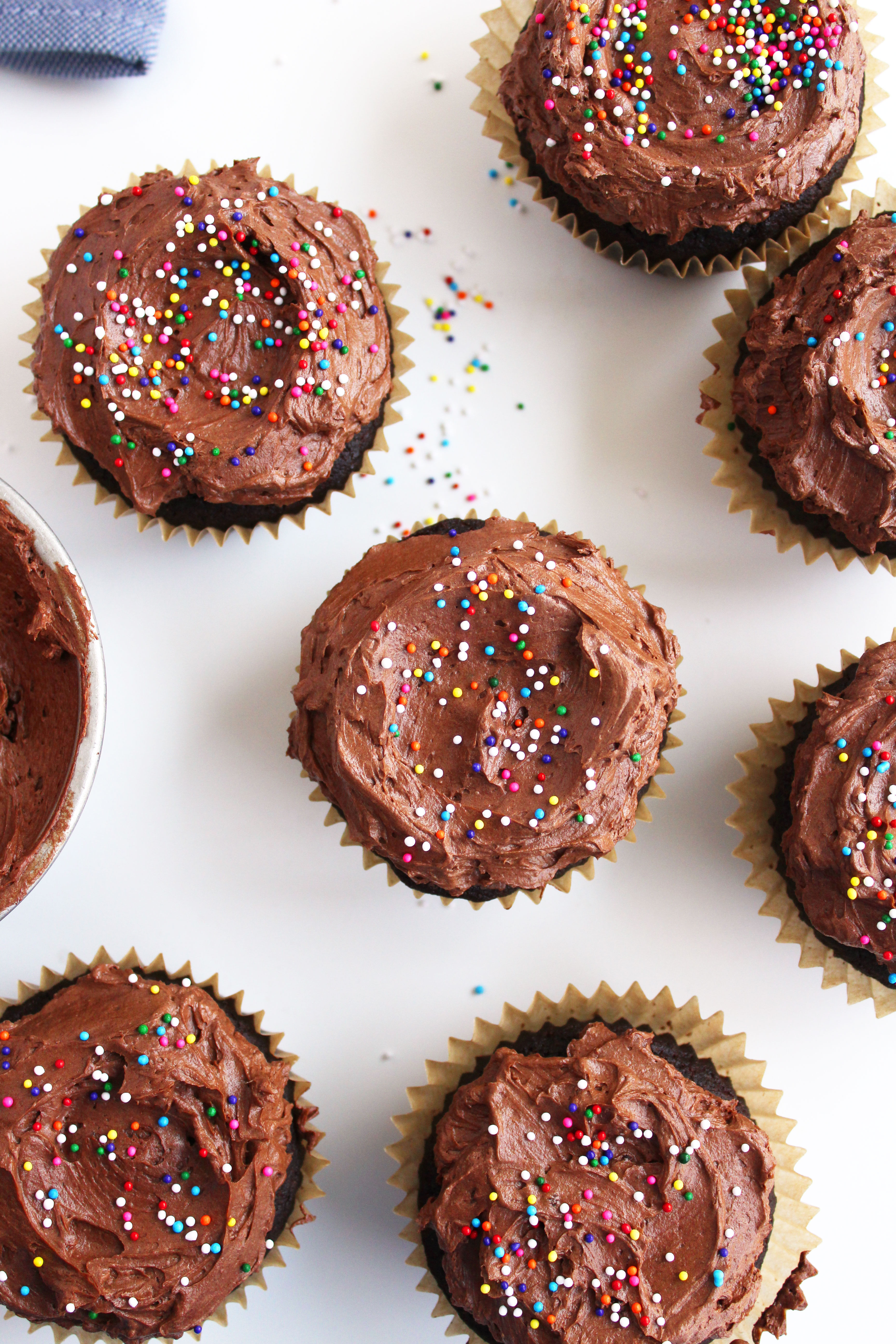 Vegan Chocolate Cupcakes (GF)! A cupcake worthy of a celebration - super chocolatey, moist, & topped with a to-die-for fudge frosting! #vegan #glutenfree #cupcakes | Peachandthecobbler.com