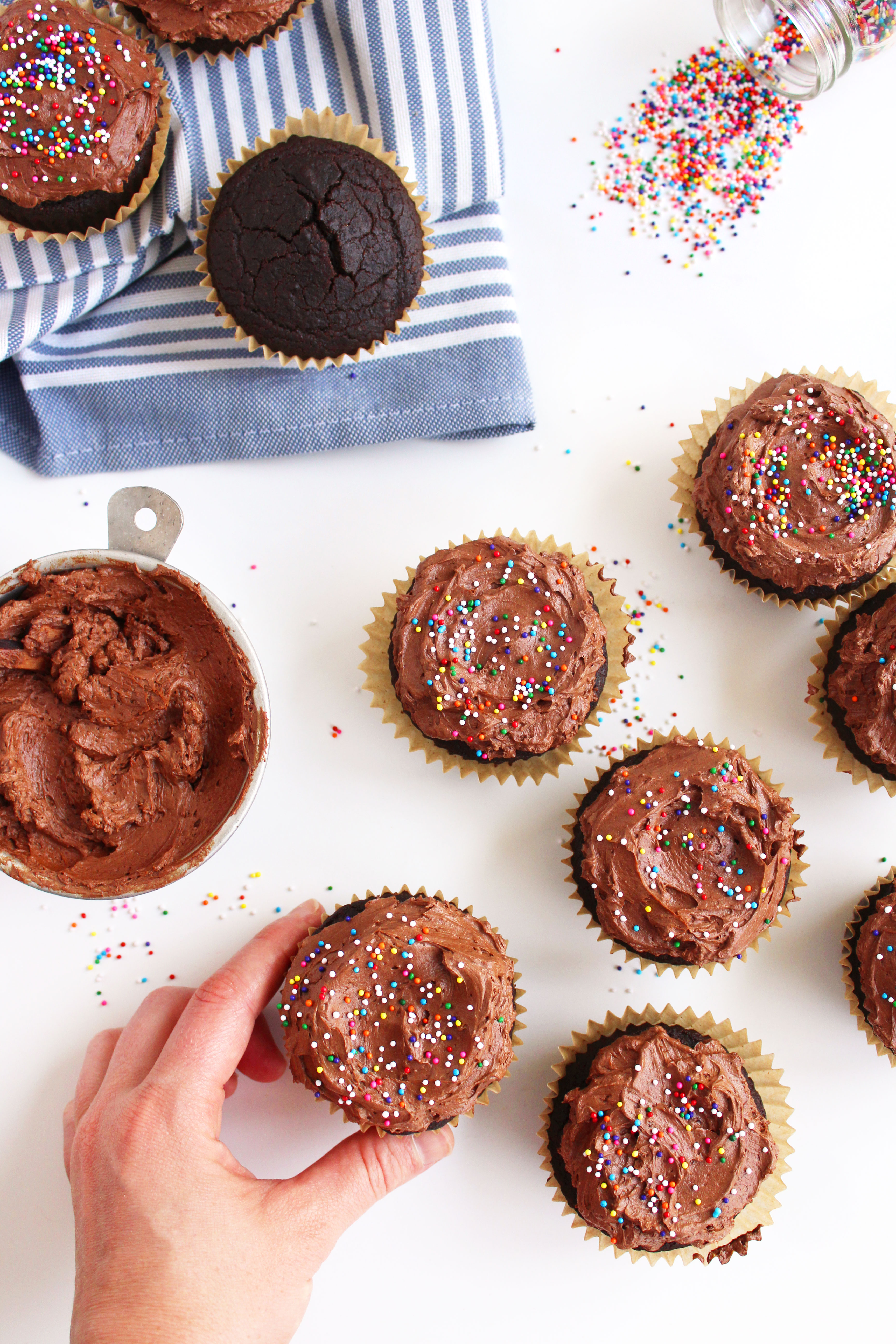 Vegan Chocolate Cupcakes (GF)! A cupcake worthy of a celebration - super chocolatey, moist, & topped with a to-die-for fudge frosting! #vegan #glutenfree #cupcakes | Peachandthecobbler.com